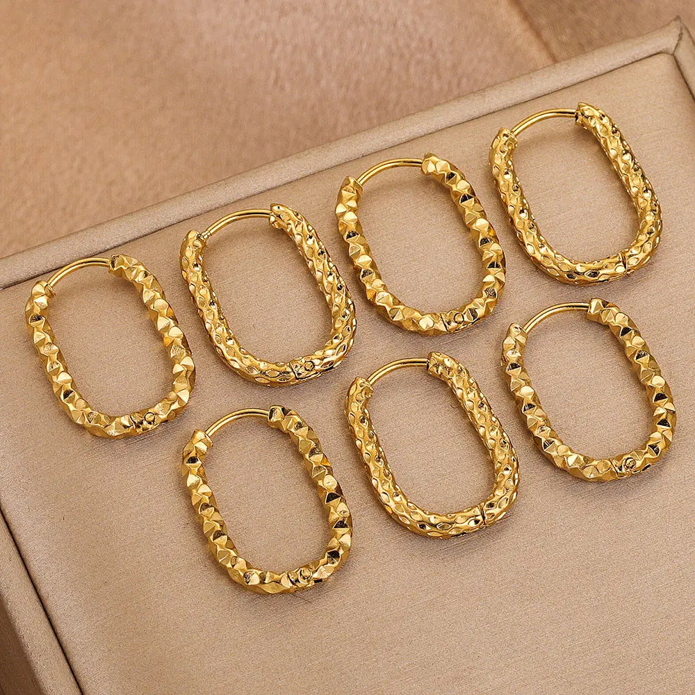 Stainless Steel Starburst-pattern Rectangular Ear Clips With A Polished Finish