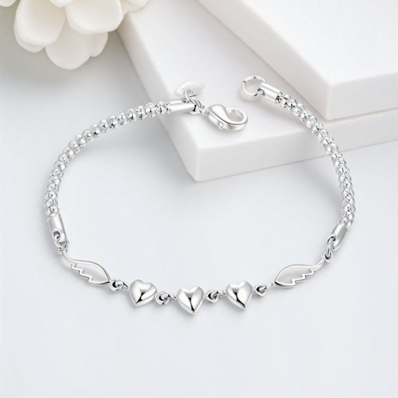 Stylish Silver-Plated Minimalist Heart-and-Feather Bracelet For Women